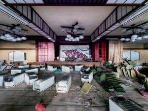 Reginald Van de Velde, Crouching Tiger, Fallen Fridges, 2012. Japan. The view from inside a luxurious Japanese hotel. Tatami mats and rice paper walls still present.